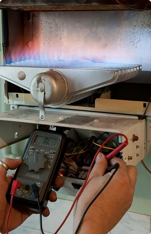 Technician performing a furnace maintenance Lincoln park